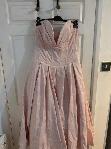 Pink house dress with - of,